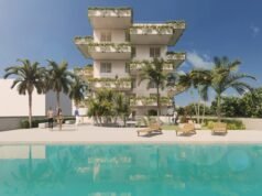 Rehabilitación sostenible: una nueva mirada sobre el hábitat urbano Edificio rehabilitado con criterios sostenibles, combinando eficiencia energética, materiales responsables y diseño contemporáneo.