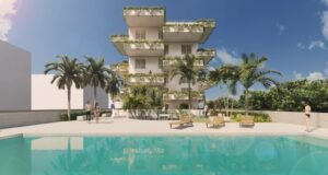 Rehabilitación sostenible: una nueva mirada sobre el hábitat urbano Edificio rehabilitado con criterios sostenibles, combinando eficiencia energética, materiales responsables y diseño contemporáneo.